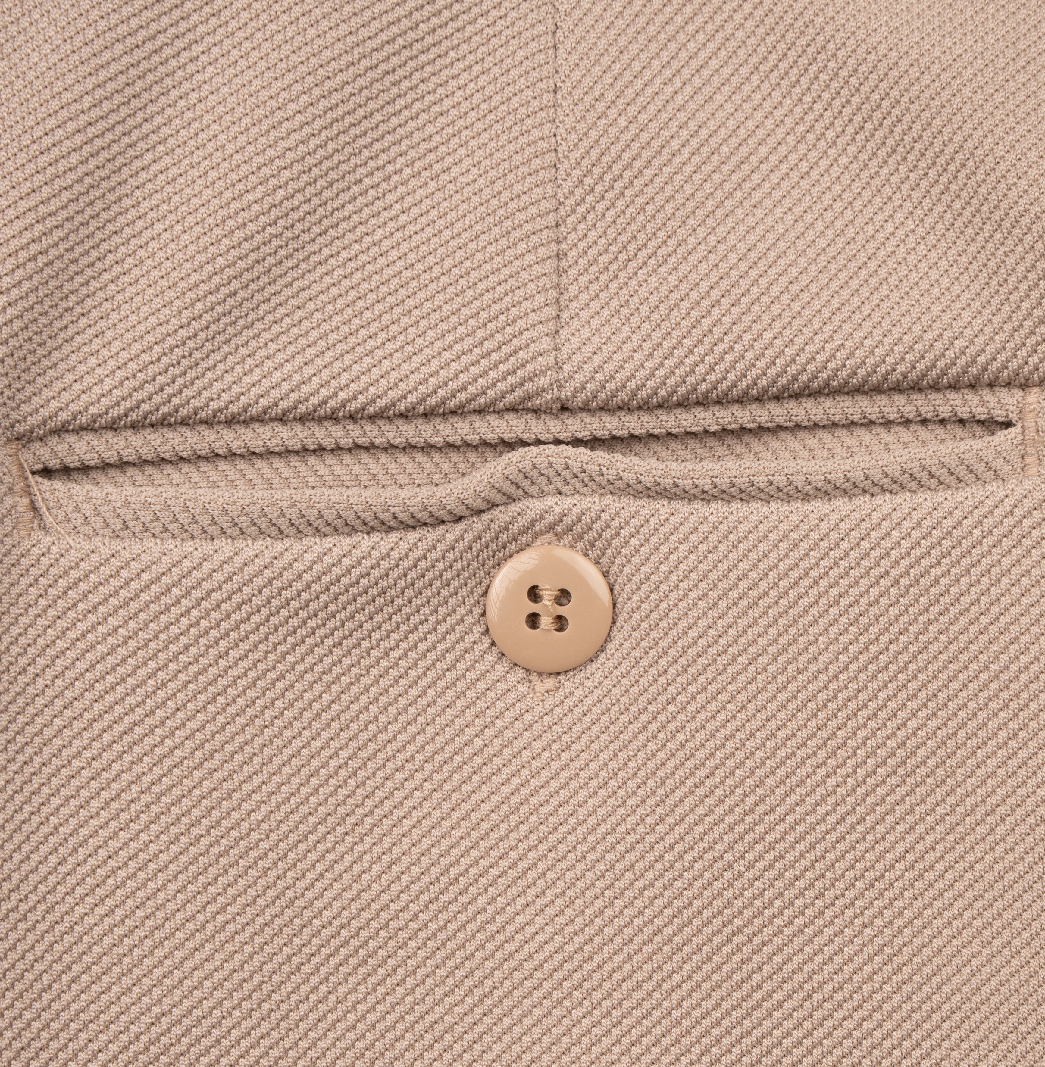 Close-up of men’s technical tailored knit trousers
