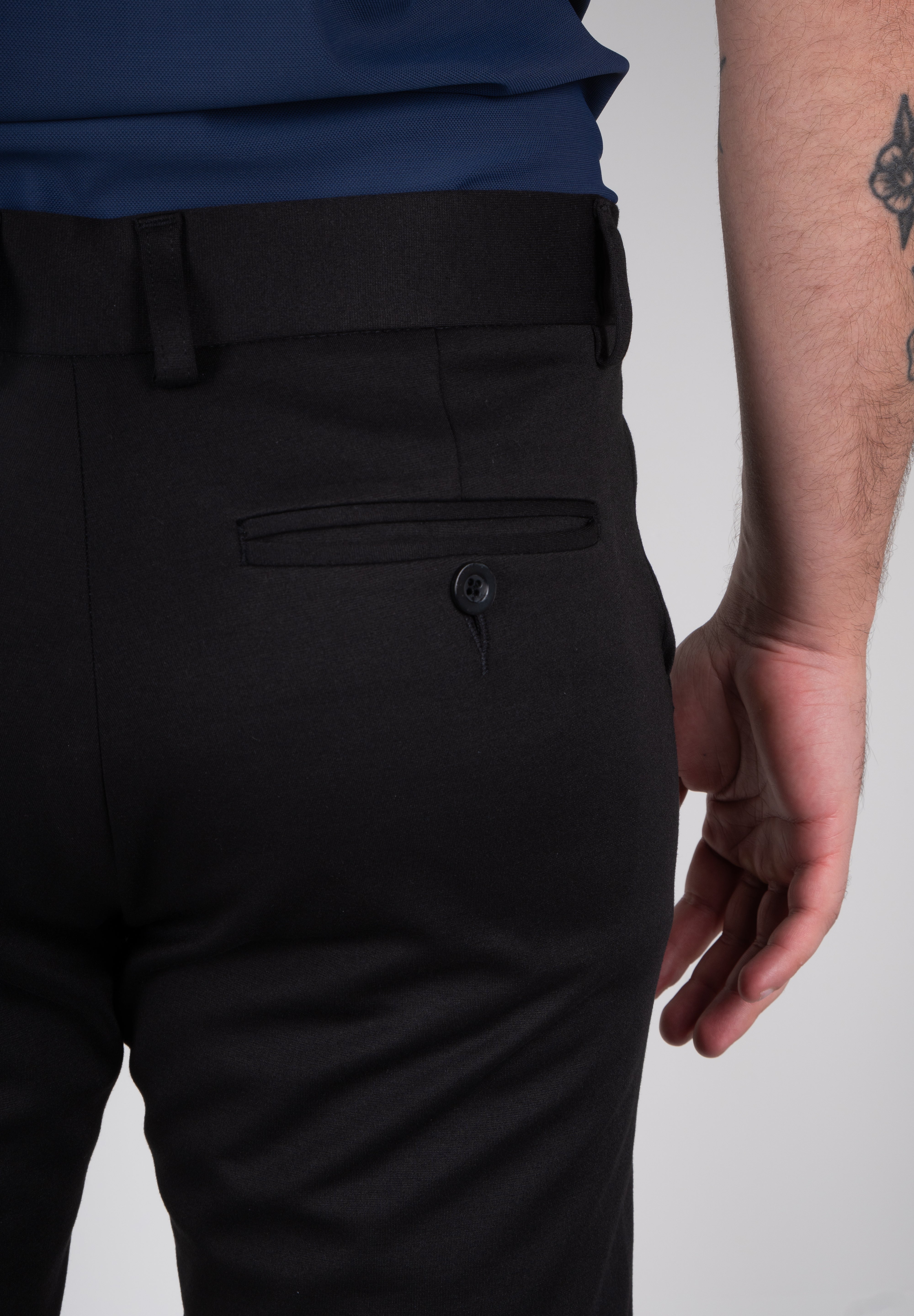 Calça Alfaiataria Masculina em Malha com Ajuste Fivela